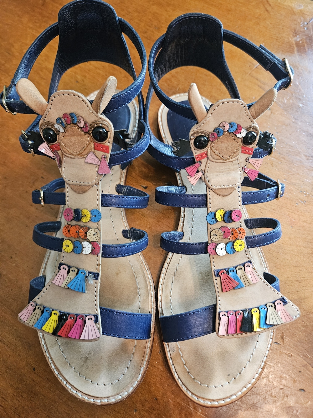 kate spade Navy Blue and Camel Tassel Gladiator Sandals.